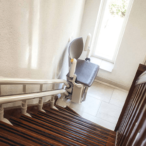 Chairlift Installation with a chair and the base of the staircase in Doylestown