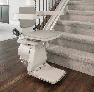 Used stairlift installed at the base of a staircase in Rockville