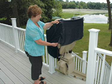 A Woman Admiring an Outdoor Stairlift at Her Essex, MD Home