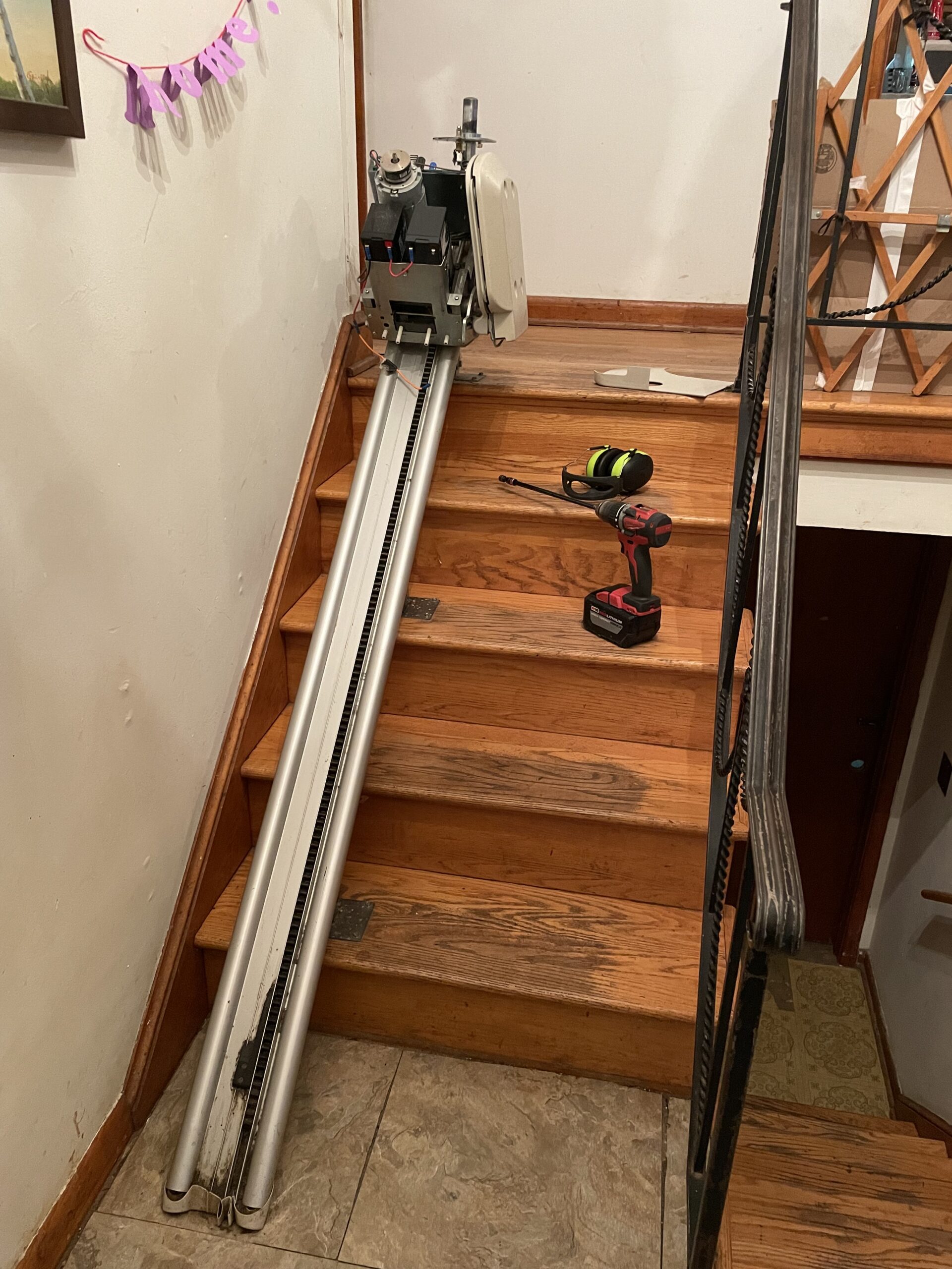 a stairlift being serviced and other Acorn Stairlift Maintenance in Doylestown, Willow Grove, Drexel Hill, Broomall, West Chester, Kennett Square